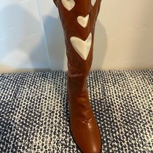 Brown boots with white hearts.  Small heel